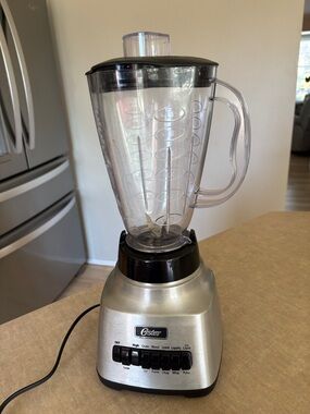 Oster Silver and Black Blender with Clear Pitcher and Accessories -GB1 Sku